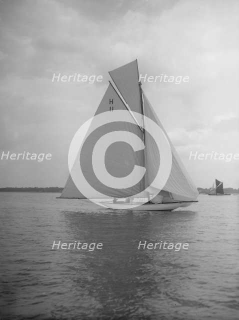 Light winds for the 8 Metre 'Ventana' (H11) sailing with spinnaker, 1912. Creator: Kirk & Sons of Cowes.