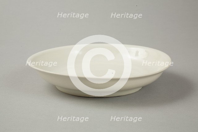 White dish with anhua design of two phoenix and cloud scroll design, Song dynasty, c.1300. Artist: Unknown.