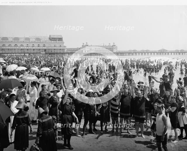 Hands up on the beach at Atlantic City, N.J., between 1900 and 1920. Creator: Unknown.