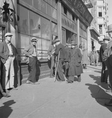 Skid Row, Howard Street, the street of the unemployed in San Francisco, California, 1937. Creator: Dorothea Lange.