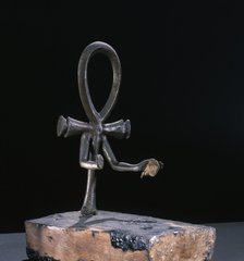 Bronze candlestick in the form of an ankh, Ancient Egyptian, 18th dynasty, c1333-1324 BC. Artist: Werner Forman