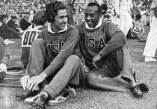 Helen Stephens and Jesse Owens, American athletes, Berlin Olympics, 1936. Artist: Unknown