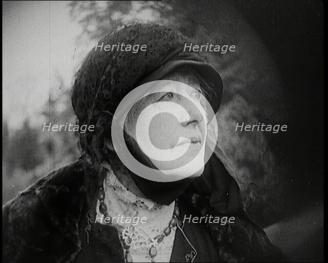 Dame Ellen Terry Standing on a Hill Looking at the View, 1920s. Creator: British Pathe Ltd.