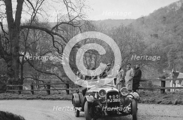Lagonda 4-seat tourer of CE Littler competing in the RAC Rally, 1939. Artist: Bill Brunell.