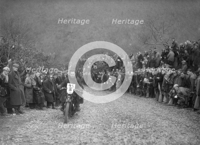 498 cc Ariel of JA Haywood competing in the MCC Lands End Trial, Beggars Roost, Devon, 1936. Artist: Bill Brunell.