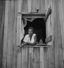Wife of turpentine worker near DuPont, Georgia, 1937. Creator: Dorothea Lange.