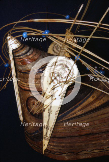 Inuit Wood hunting cap with ivory ornament collected during Cooks 3rd voyage, 1776-1780. Artist: Unknown.