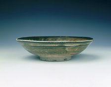 Stoneware bowl with moulded peony scroll and lions, Jin dynasty, China, 13th century. Artist: Unknown