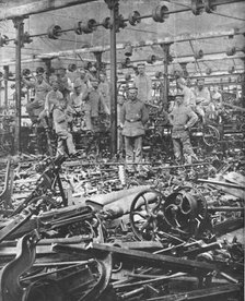'La Suppression de L'Industrie Francaise; la destruction au Marteau des metiers du tissage..., 1917. Creator: Unknown.