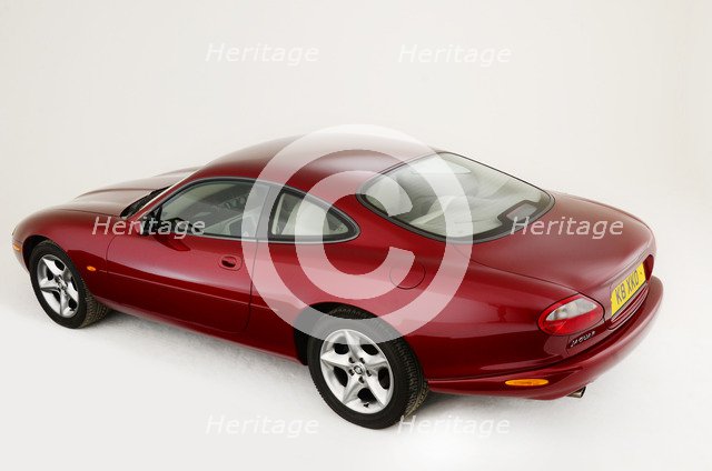 1999 Jaguar XK8 coupe Artist: Unknown.