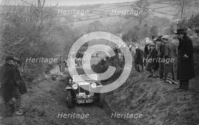 MG TA of WH Depper competing in the MG Car Club Midland Centre Trial, 1938. Artist: Bill Brunell.