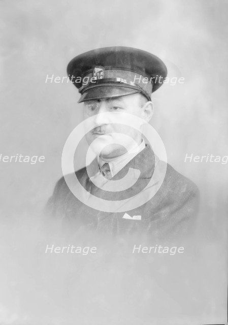 Portrait of a man in uniform, c1935. Creator: Kirk & Sons of Cowes.