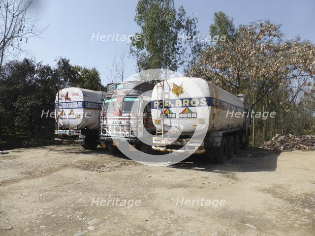 Tata trucks with heavy loads, India. Creator: Unknown.