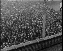 Crowds of People in a Sports Stadium, 1921. Creator: British Pathe Ltd.