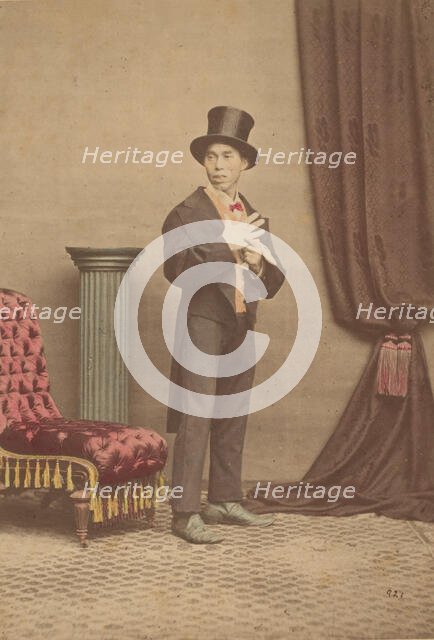 [Studio Portrait of a Japanese Man in Western Clothing], 1880s. Creator: Baron Raimund von Stillfried.