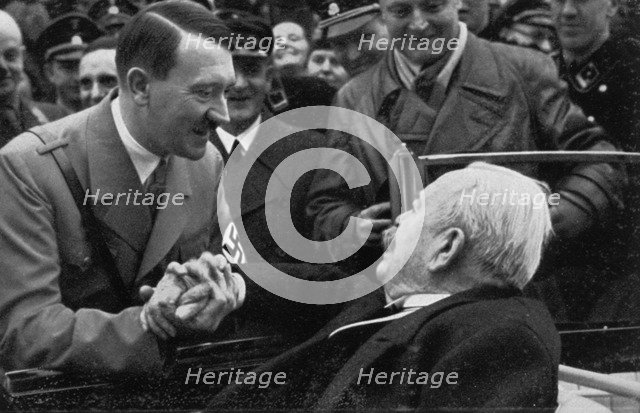 Adolf Hitler greeting General Karl Litzmann on his birthday, 1934. Artist: Unknown
