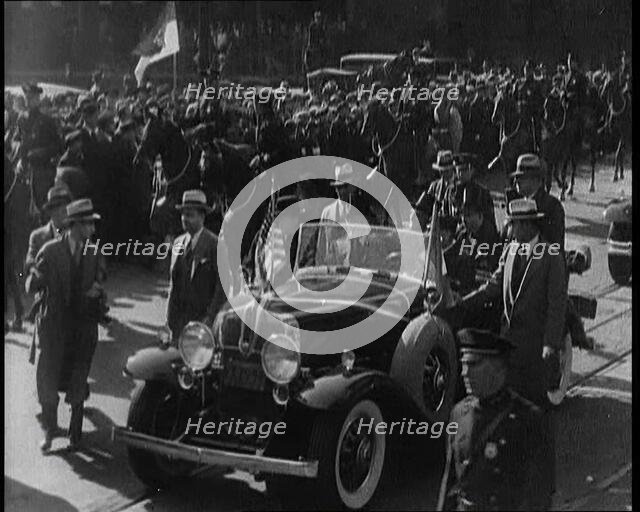 Pierre Laval, the French Premier, in an Open Top Car Driving Though the Crowded Streets..., 1932. Creator: British Pathe Ltd.