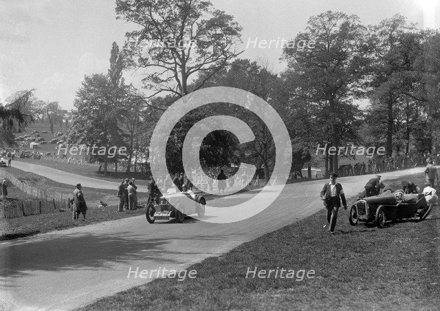 MG J2 passing the crashed Austin 7 of B Sparrow, Donington Park Race Meeting, Leicestershire, 1933. Artist: Bill Brunell.