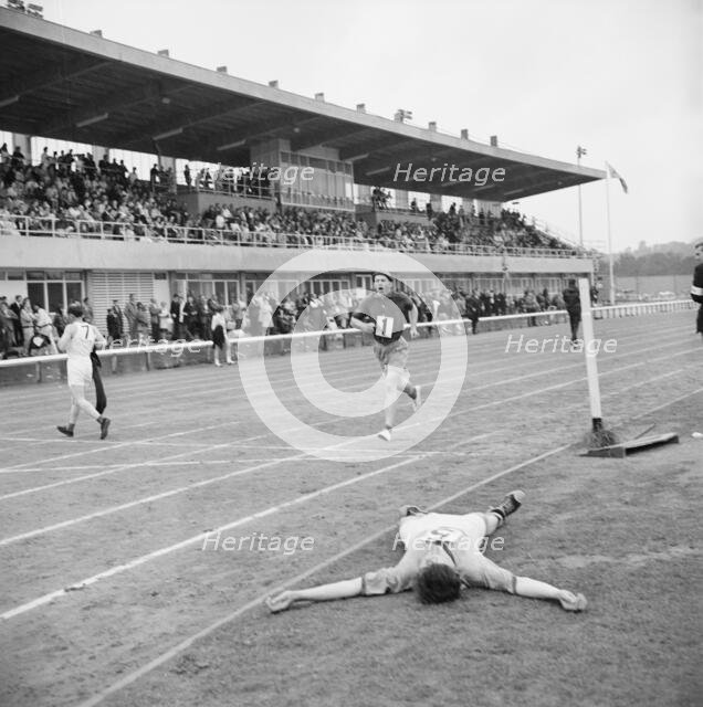 Copthall Stadium, Hendon, Barnet, London, 25/06/1966. Creator: John Laing plc.