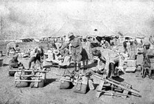 ''La Turquie Succombe; L'inspection des selles des chameaux employes aux transports', 1918. Creator: Unknown.