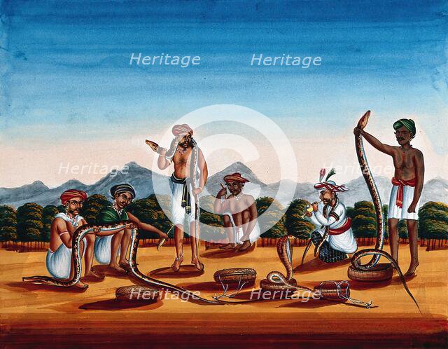 Six snake charmers displaying their snakes, (between 1800 and 1899?). Creator: Unknown.