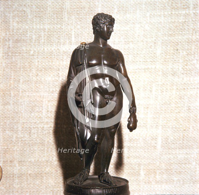 Mercury holding a purse, carrying a traveller's cloak. Roman brronze, 1st century. Artist: Unknown.