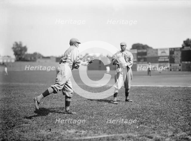 Harry Hooper, Left; Unidentified, Right; Boston Al (Baseball), 1913. Creator: Harris & Ewing.