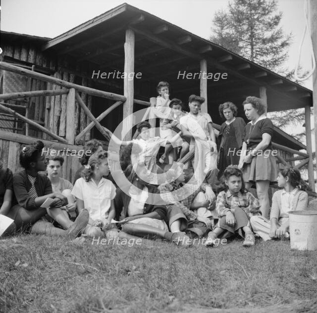 Planning a day's activity at Camp Gaylord White, Arden, New York, 1943. Creator: Gordon Parks.
