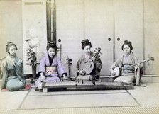 Geisha playing traditional musical instruments, Japan, 1880. Artist: Unknown