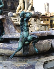 Fountain of Neptune in the Piazza della Signoria in Florence. Detail of Triton, bronze figure sur…