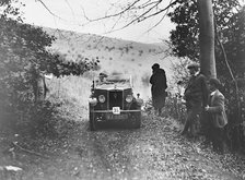 Morris Minor tourer of JE Clowes competing in the Inter-Varsity Trial, November 1931. Artist: Bill Brunell.