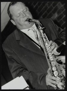 Alan Barnes (alto saxophone) playing at The Fairway, Welwyn Garden City, Hertforrdshire, 2002. Artist: Denis Williams