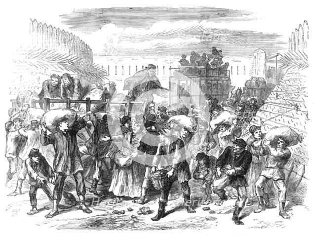 Pillaging the first vegetable carts at the gates of Paris, 1871. Creator: Unknown.