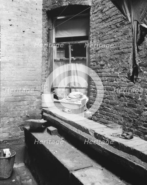 Tenement dwelling of Mr. and Mrs. Jacob Solomon, New York City, 193 Creator: Dorothea Lange.