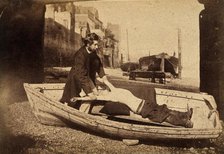 A man and a boy with bare torso in a rowing boat grounded on a beach..., c1860s. Creator: Unknown.