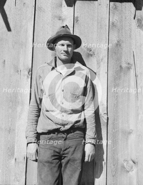 One of the thirty-six members of the Ola self-help sawmill co-op, Gem County, Idaho, 1939. Creator: Dorothea Lange.