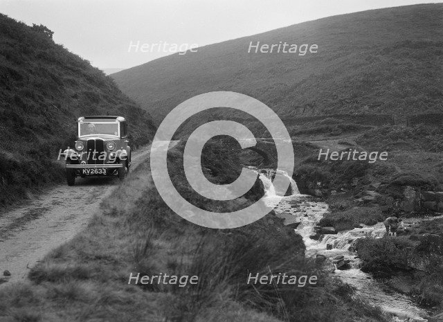 Kitty Brunell road testing a Standard Little Twelve saloon, c1932. Artist: Bill Brunell.