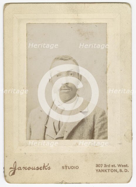 Photograph of a man wearing a light colored jacket, vest and necktie, late 19th century. Creator: Louis Janousek.