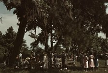 A Fourth of July celebration by a group of Negroes, St. Helena Island, S.C., 1939. Creator: Marion Post Wolcott.