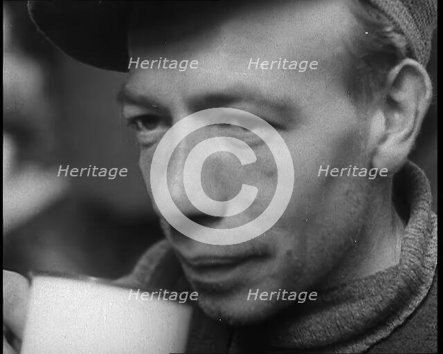 Dutch Refugee Drinking Tea at a Reception Centre in the United Kingdom, 1940. Creator: British Pathe Ltd.