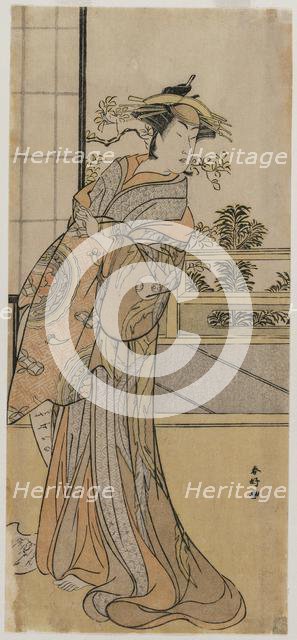Arashi Murajiro as a Courtesan Holding a Letter, late 1780s. Creator: Katsukawa Shunko (Japanese, 1743-1812).