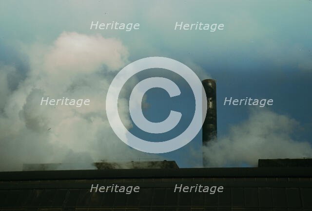 Busy stacks give evidence of all-out war production...Owens-Corning Fiberglass Co, Akron, Ohio, 1942 Creator: Alfred T Palmer.