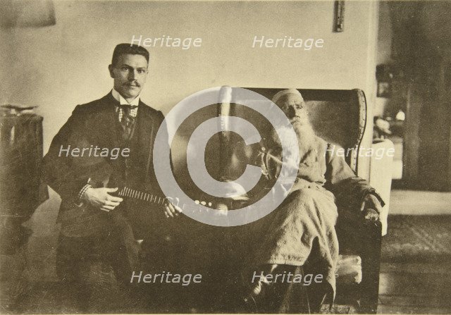 Russian author Leo Tolstoy with the balalaika player Boris Troyanovsky, Russia, 1909. Artist: Sophia Tolstaya