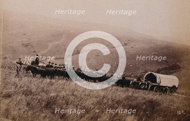 South Africa: landscape with people, a wagon and oxen in the foreground, 1896. Creator: Unknown.