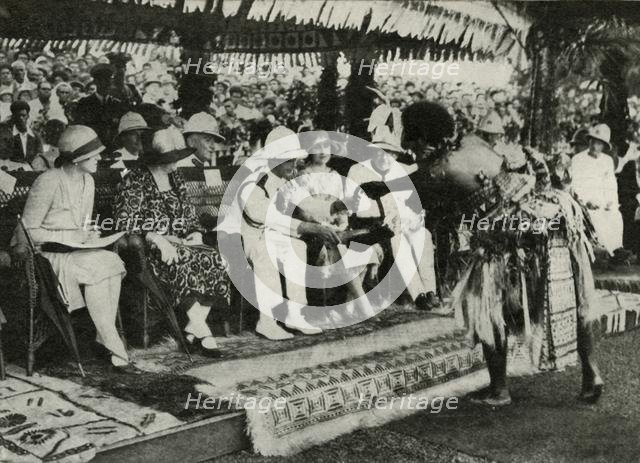 'At Suva, Fiji. Presenting a "Tabua" (Tooth of the Sperm Whale) ...1927', 1937. Creator: Unknown.