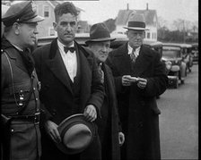 Male American Civilians Being Arrested by the Police, 1930. Creator: British Pathe Ltd.