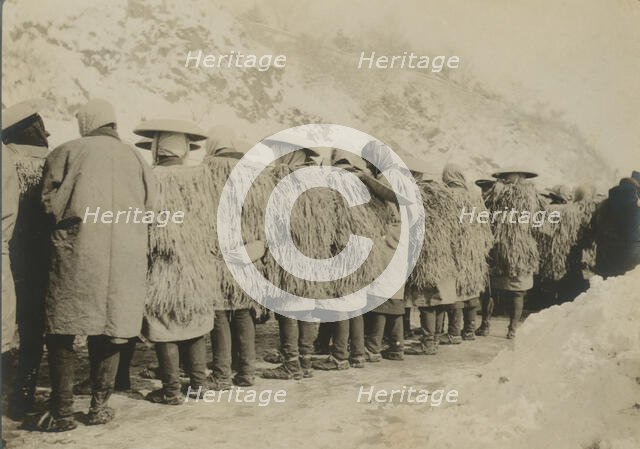 Japanese coolies in winter costume, c1904. Creator: Robert Lee Dunn.