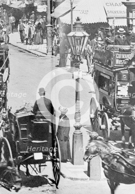 The Strand with Charing Cross Station to the right, Westminster, London, c1900. Artist: Unknown
