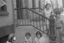 Children playing in the street, 61st Street between 1st and 3rd Avenues, New York, 1938. Creator: Walker Evans.