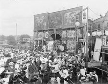 Exterior general view of Purchases Menagerie and crowd at Witney Fair, Oxfordshire, 1860-1922. Creator: Henry Taunt.